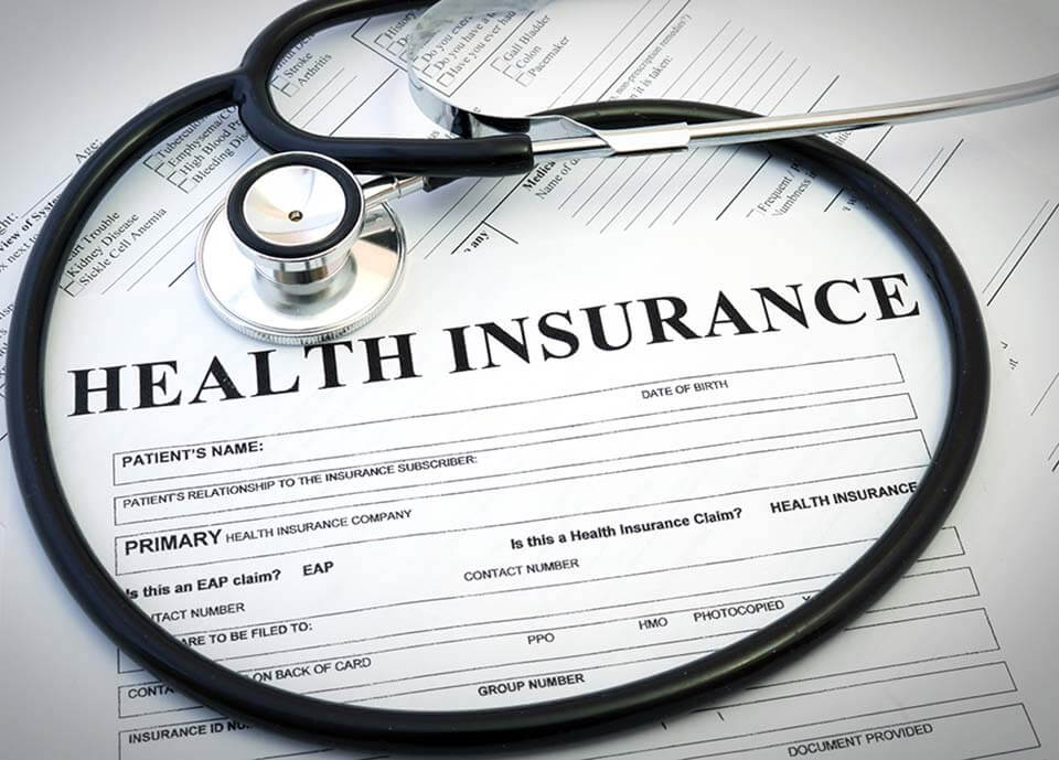 Health insurance and a stethoscope