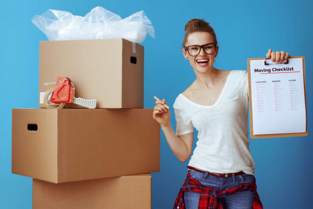 A girl with a moving checklist ready for local movers in Chicago